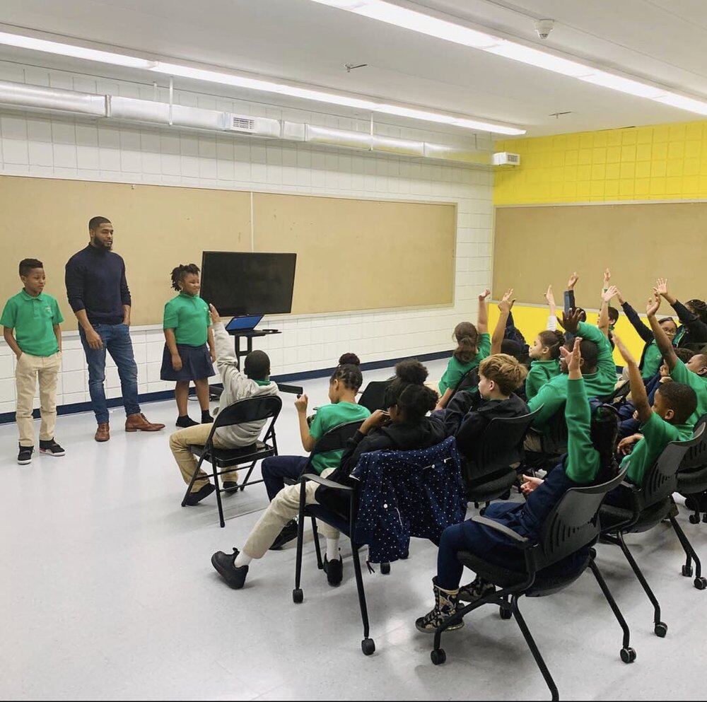Brian Mays speaking with students in Newark, New Jersey